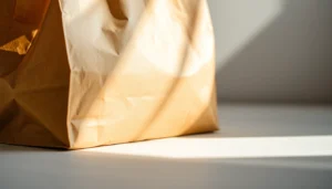 High-quality torba papierowa being filled with eco-friendly materials in a modern packaging